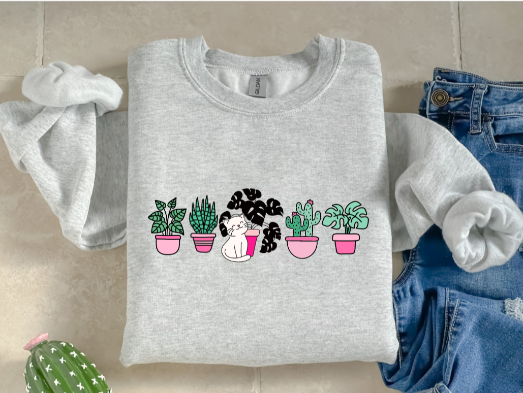 Smiling Cat Standing Next to a Plant Sweatshirt